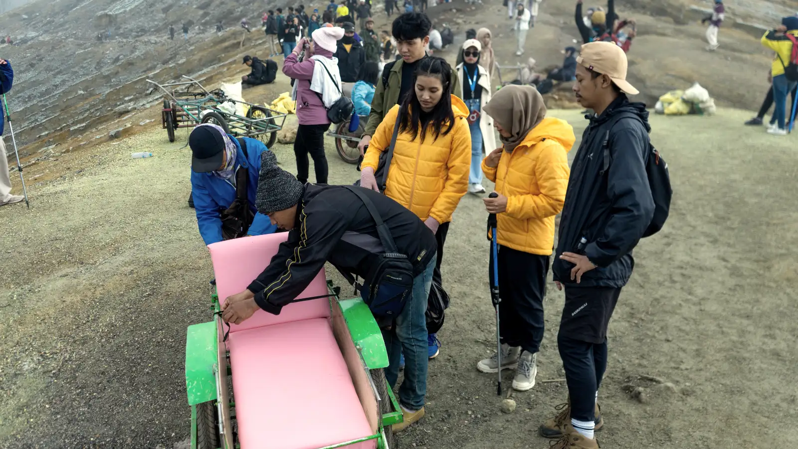 Ijen Trolley Taxi Hub at the Rim A group of trolley taxis waiting for passengers near the crater rim of Mount Ijen