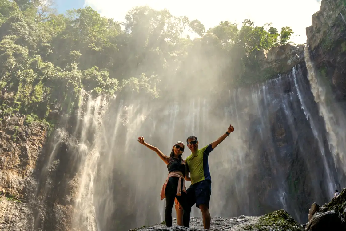 Ijen Crater Tour 2026 Ijen Crater acidic lake with turquoise water and volcanic steam
