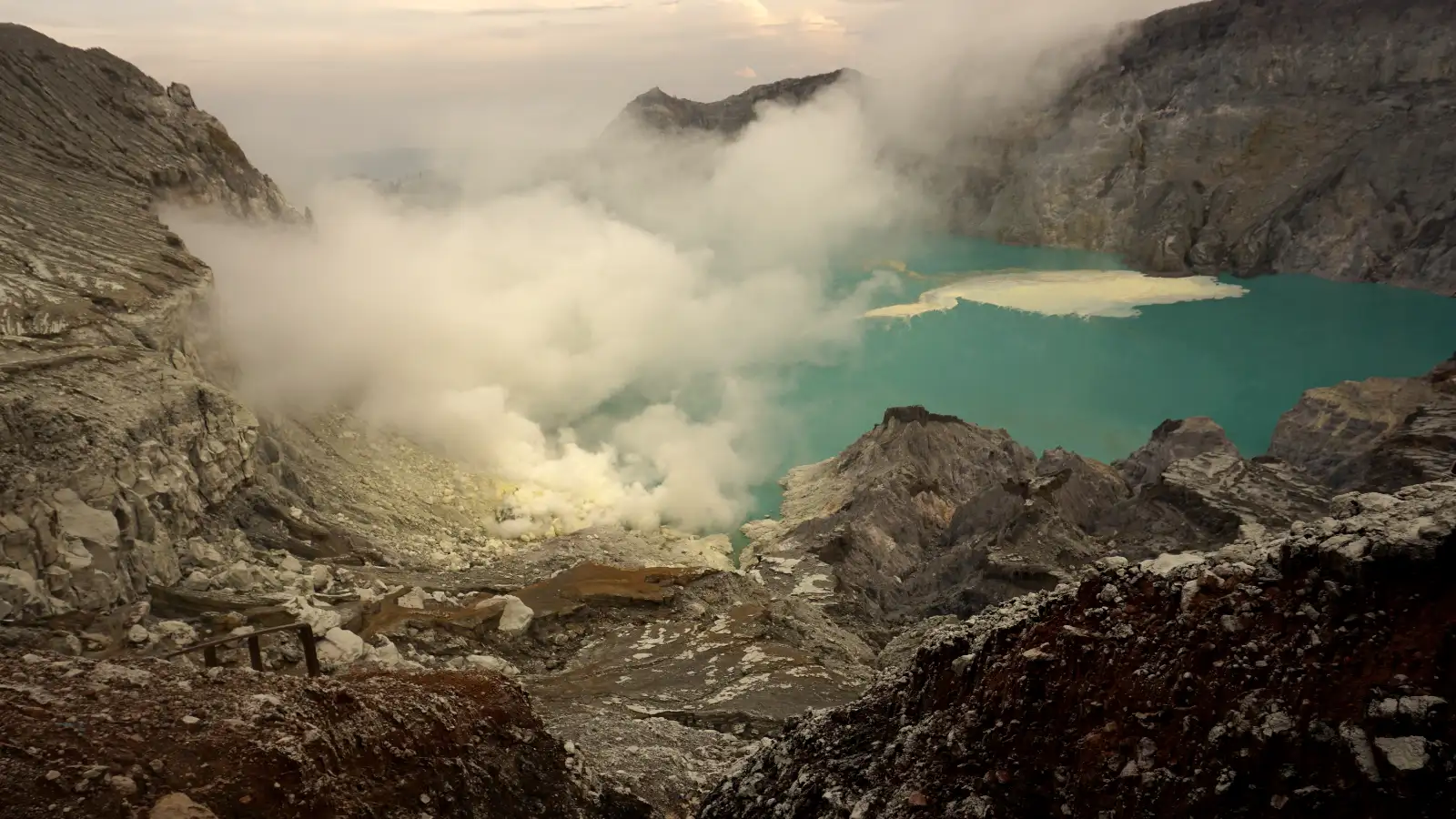 Ijen Acidic Lake Formation Close-up of the bright turquoise acidic lake inside the Ijen volcanic crater