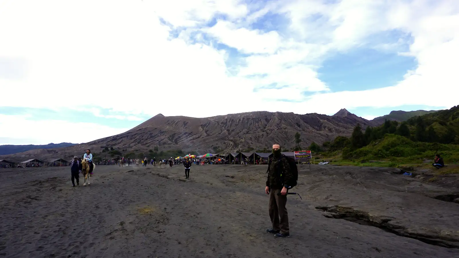 Mount Bromo Caldera Landscape at Dawn Sunrise over Mount Bromo caldera with Sea of Sand and surrounding peaks