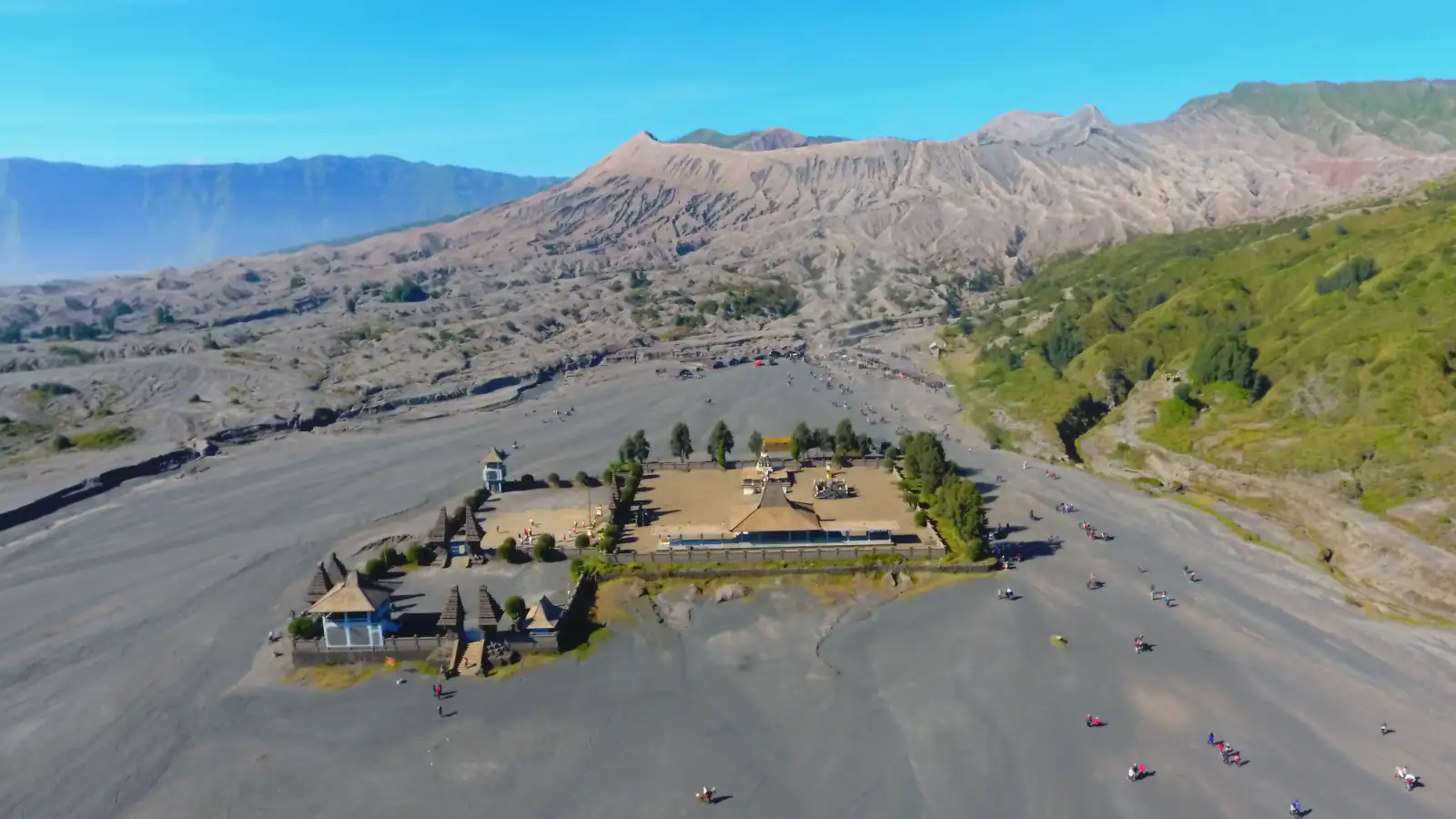 Rugged volcanic terrain and hiking paths leading to the Mount Bromo crater rim