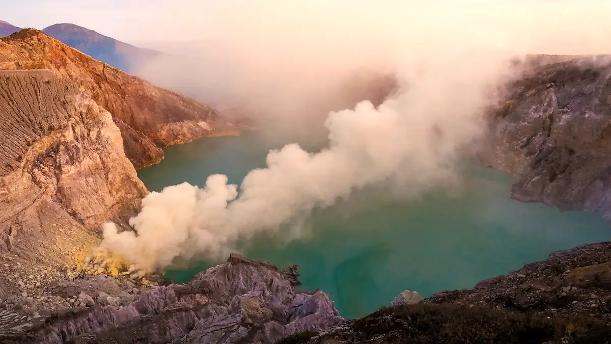 Sulfur vents and miners in the Ijen volcanic landscape